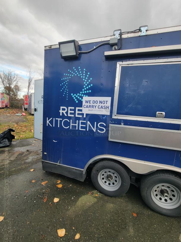 2020 Rock Solid 16' mobile trailer, blue with "REEF KITCHENS" logo. Exterior sign reads "WE DO NOT CARRY CASH."
