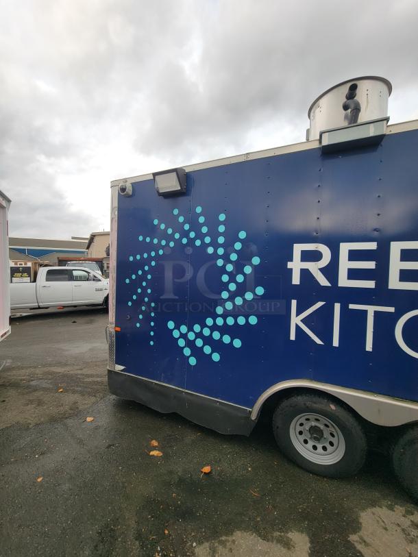 2020 Rock Solid 16' mobile trailer with custom graphics, part of a high-end ghost kitchen setup. Weather-resistant exterior.