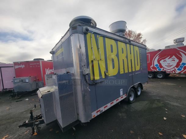 2018 16' Quality Cargo food trailer, fully equipped, gray with bold yellow "NBRHD" branding, ready for catering or vending.