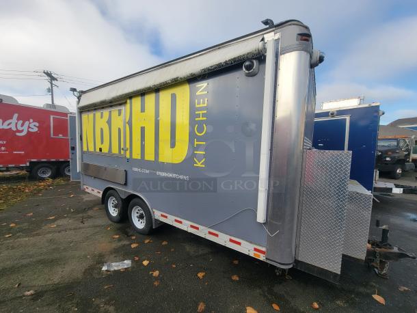 2018 Quality Cargo 16' food trailer, grey with "NBRHD Kitchen" signage, dual-axle, excellent condition. VIN: 1Z9Z1EH20JP475255.