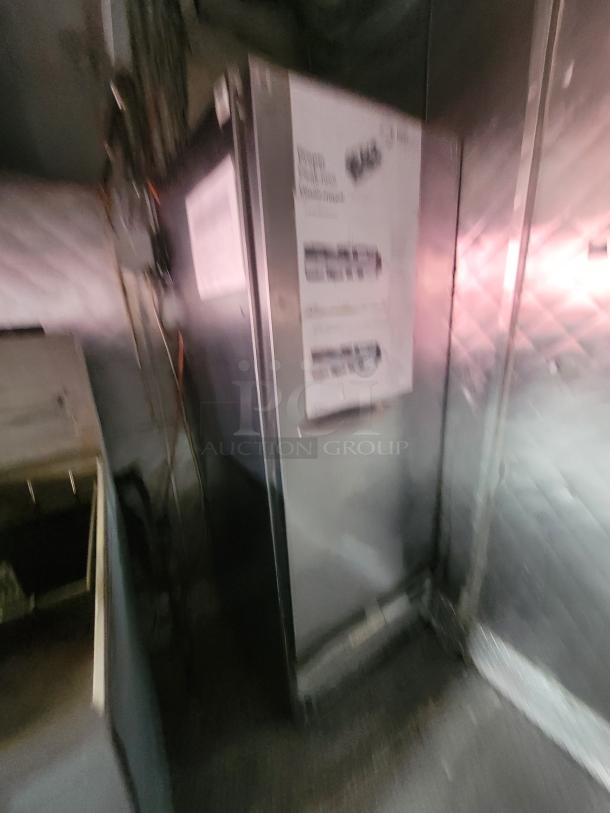 Quality Cargo 2018 16' food trailer interior. Features professional-grade kitchen equipment and utility systems. Model 16.