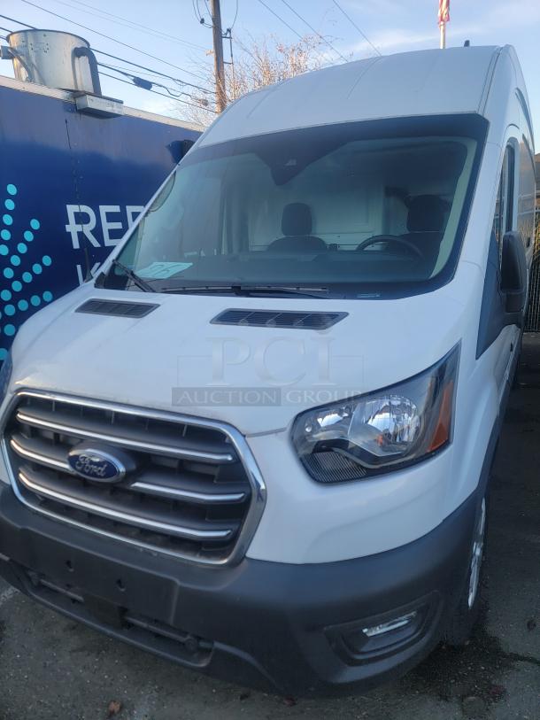 2020 Ford Transit 350 Cargo Van, high roof, low mileage under 3k, white exterior, SRW model with 148-inch wheelbase.