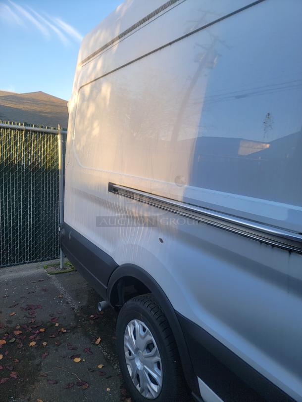 2020 Ford Transit 350 Cargo Van, high roof, low under 3k miles, 148-inch wheelbase, SRW, clean cargo area, V6 engine.