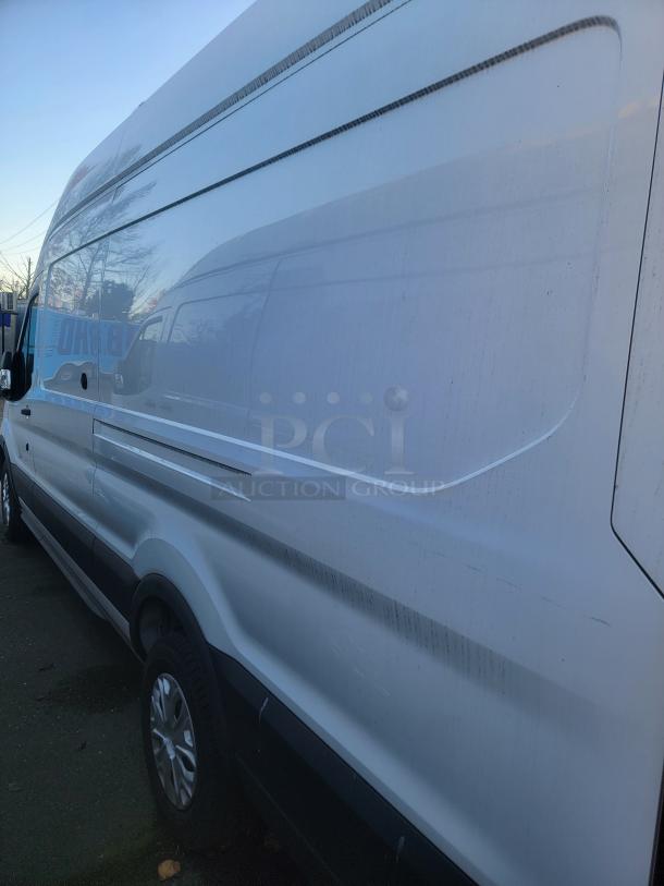 2020 Ford Transit 350 Cargo Van with High Roof, low mileage under 3,000 miles, white exterior, 148-inch wheelbase.