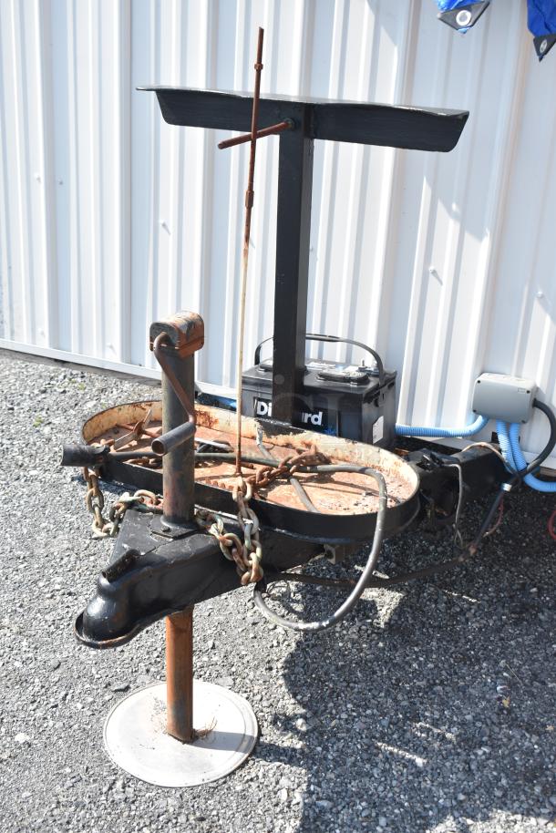 Unbranded food trailer with Diehard 27DC-2 battery, Eaton power box, visible counter, and ventilation fan, shown on gravel.