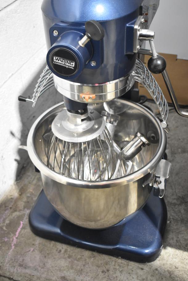 BRAND NEW Waring WSM20LT 20 Qt Planetary Dough Mixer with bowl, guard, whisk, paddle, and hook attachments.