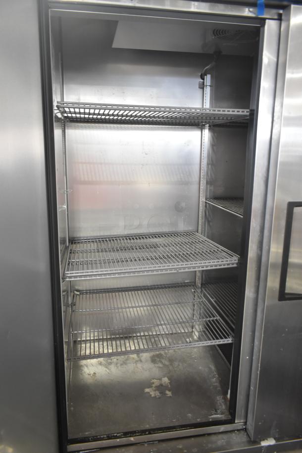 2020 True T-49-HC Commercial 2 Door Cooler, stainless steel, on casters, shelves visible, 115V, 1 Phase.