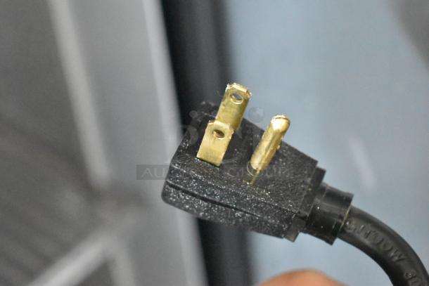 Power plug for 2020 True T-49-HC Commercial Cooler, 115V, 1 Phase, close-up view.