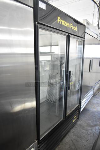 True GDM-49F-LD Commercial 2 Door Reach In Freezer Merchandiser, 115/208-230 Volts, 1 Phase, clear glass doors, "Frozen Food" label.