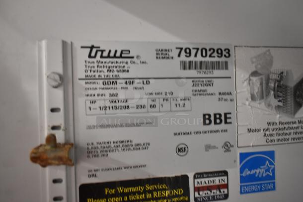 True GDM-49F-LD commercial freezer label, model number and specs, 115/208-230V, 1 phase, Energy Star certified.