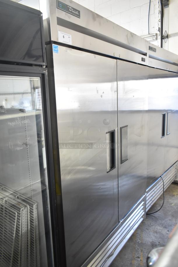 2019 True T-49F-HC commercial freezer, 2 doors, stainless steel, on casters, 115 volts, minor wear, True logo visible.