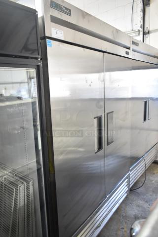 2019 True T-49F-HC commercial freezer, 2 doors, stainless steel, on casters, 115 volts, minor wear, True logo visible.