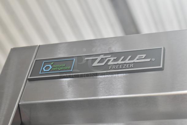 2019 True T-49F-HC commercial freezer, dual doors, stainless steel, natural refrigerant logo, commercial casters, 115V.