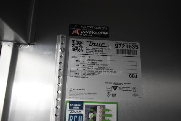 2019 True T-49F-HC commercial freezer label showing model, voltage, phase, and refrigerant details.