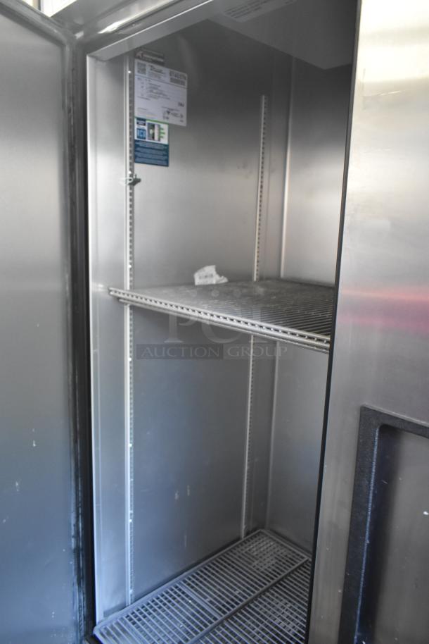 2019 True T-49-HC commercial 2-door cooler, stainless steel, adjustable shelves, on casters, 115V, 1 phase, clean interior.