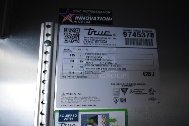 2019 True T-49-HC Commercial Cooler label, model and specs visible, including voltage, refrigerant type, and certifications.
