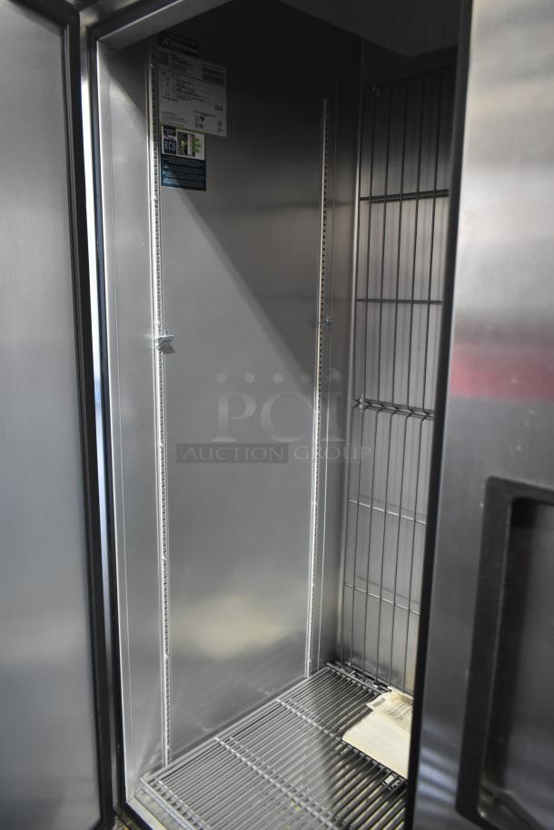2020 True T-49F-HC Commercial 2 Door Reach-In Freezer, stainless steel interior, commercial casters, excellent condition.