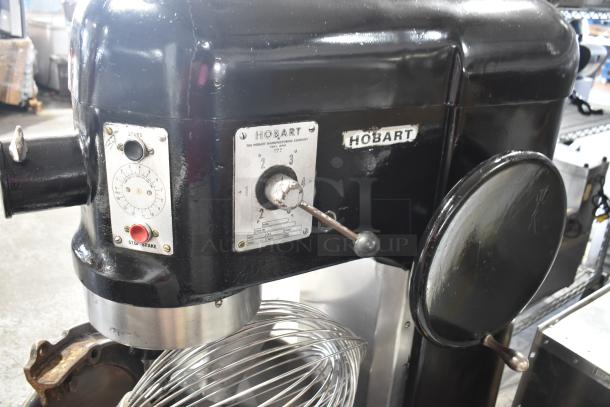 Hobart L800 80-quart commercial planetary dough mixer with mixing bowl, paddle, whisk, and dough hook attachments. 220V, 3-phase.