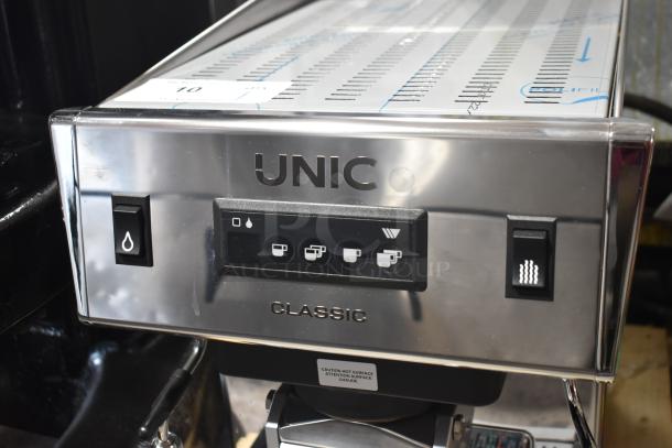 Unic CL1 Classic commercial espresso machine, stainless steel, with control panel and caution label; 110/208 volts, 1 phase.