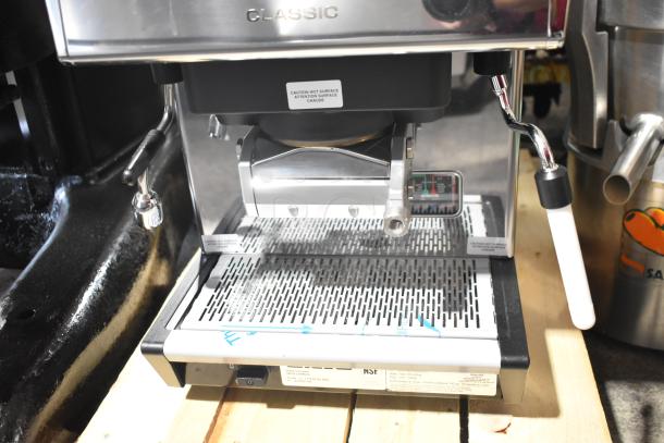 Unic CL1 Classic commercial countertop espresso machine, single group, stainless steel, 110/208V, visible caution label.