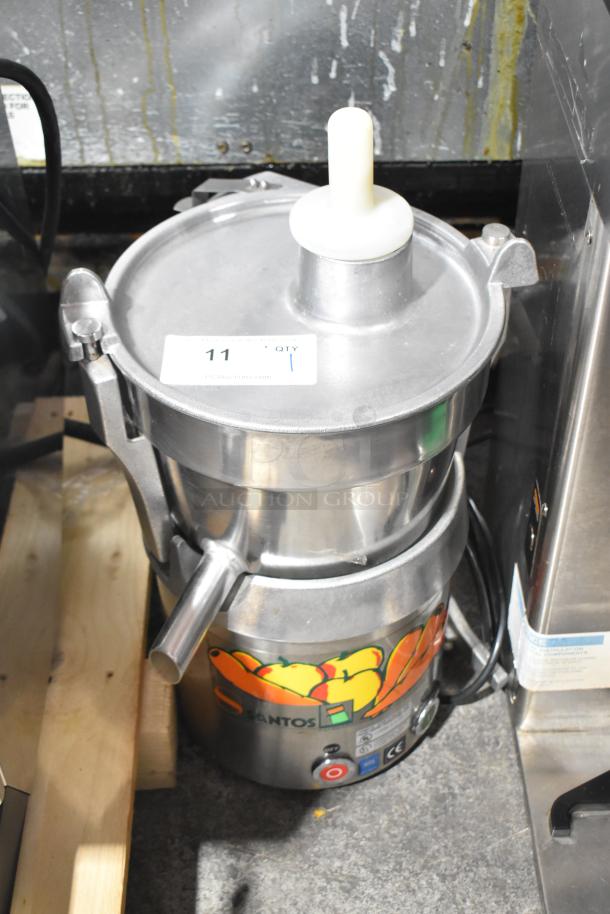 Santos Commercial Countertop Juice Extractor, 115 Volts, 1 Phase, stainless steel, with branding and control buttons visible.