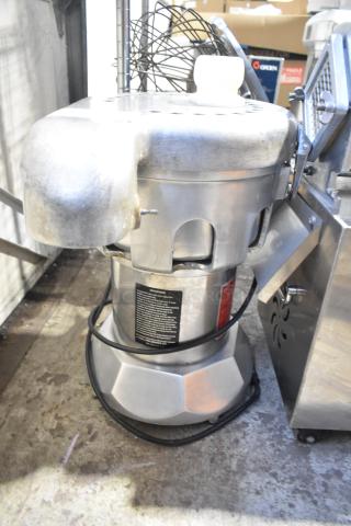 Ruby 2000 Commercial Juice Extractor, countertop model, 115 volts, 1 phase, in used condition.