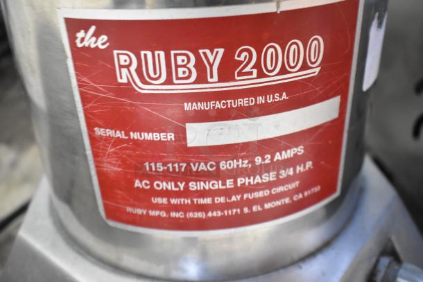Ruby 2000 Commercial Juice Extractor label showing electrical specs: 115-117 VAC, 60Hz, 9.2 AMPS, single phase.