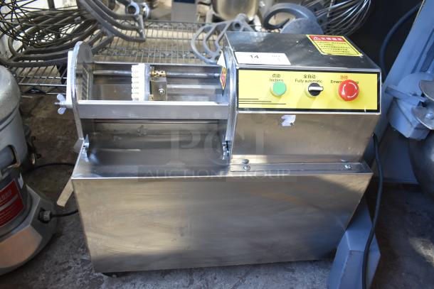 Stainless steel electric vegetable cutter on casters, multifunctional with inching, full auto, and emergency stop controls.
