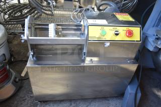Stainless steel electric vegetable cutter on casters, multifunctional with inching, full auto, and emergency stop controls.
