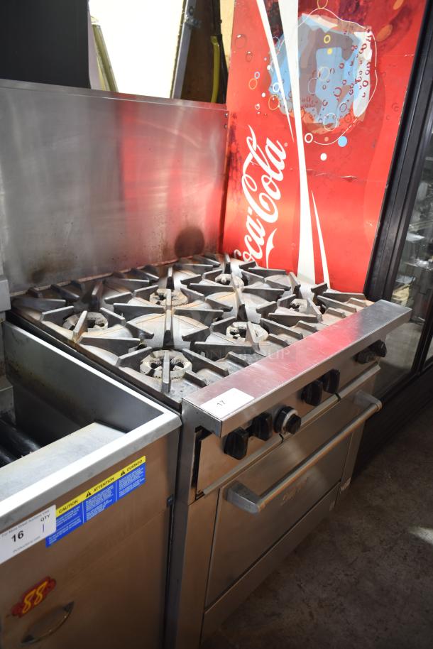 Garland X36-6R SunFire 6 Burner Range, stainless steel, gas-powered, with oven, over shelf, and back splash.