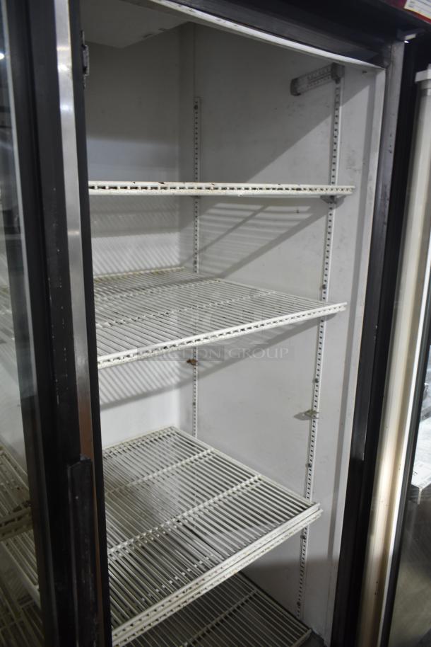 True GDM-49 Commercial 2 Door Cooler Merchandiser, glass doors, interior shelves, 115V, 1 Phase, used condition.