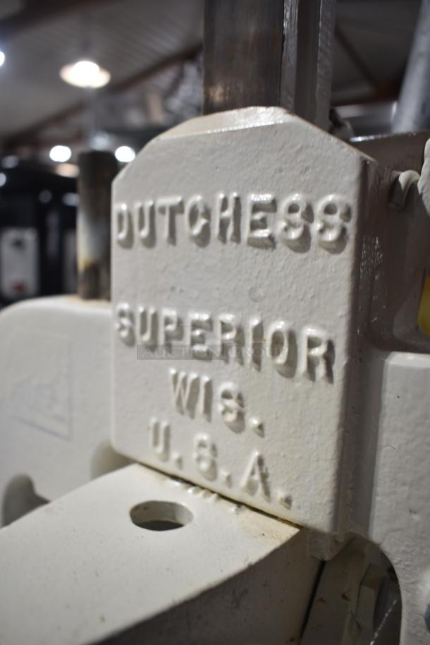 Dutchess BM58 manual dough divider, floor model, on commercial casters. "Dutchess Superior Wis. U.S.A." embossed tag.