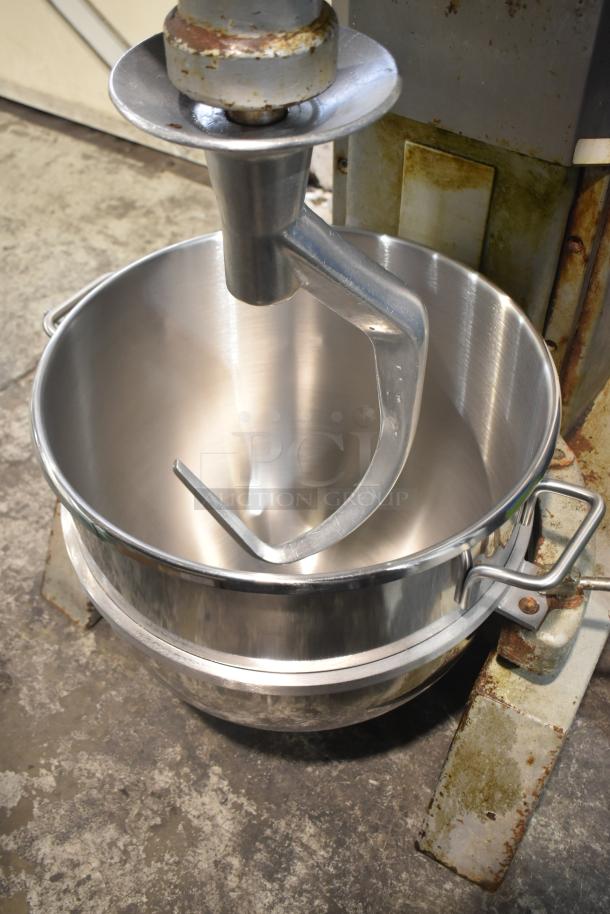 Hobart P660 60 Quart Mixer with bowl and dough hook, 208-240V, 3 phase. Sturdy design, visible wear on stand.