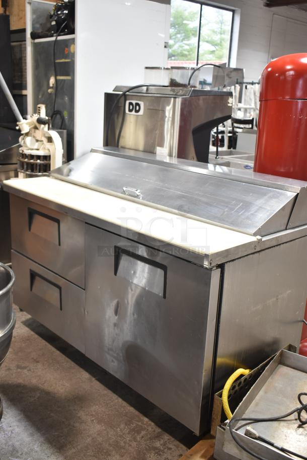 True TSSU-60-16D-2-HC commercial prep table with two drawers, one door, and commercial casters. 2019 model, stainless steel.