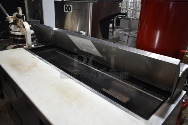 2019 True TSSU-60-16D-2-HC commercial prep table. Features 2 drawers, 1 door, on casters. 115V, 1 phase, stainless steel.