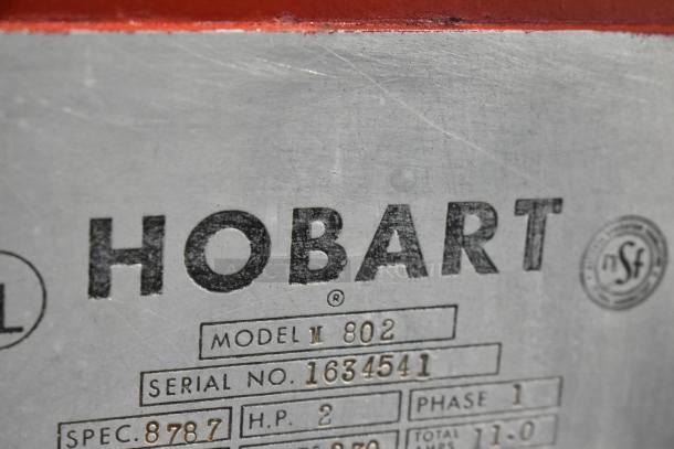 Hobart M802 commercial mixer plate showing model, serial number, and specs. 230V, 1 Phase, with NSF logo.