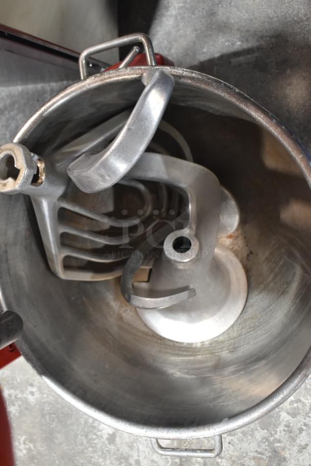 Hobart M802 80-quart mixer with bowl, dough hook, whisk, and paddle attachments, 230V, 1 phase. Visible wear, sturdy build.