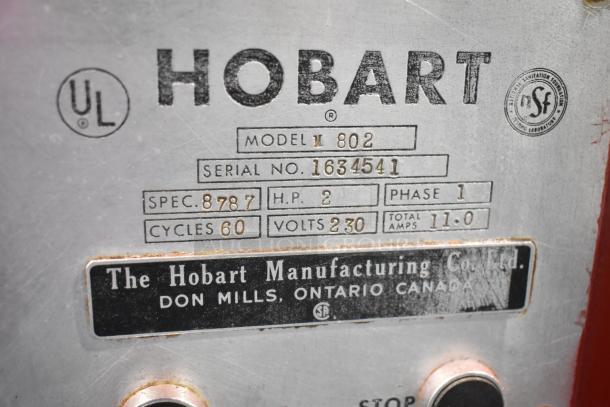 Hobart M802 80 Quart Mixer label showing model, serial number 1634541, 230V, 1 Phase, 2 HP, 11 AMPS. UL and NSF certified.