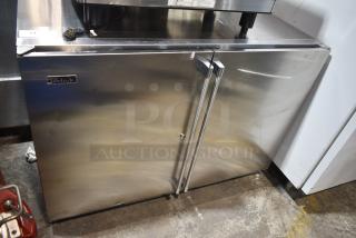 Brand new Perlick HC48RS4S-00-SLFLR-SRFLR 2-door back bar cooler, stainless steel, 115V, scratch and dent condition.