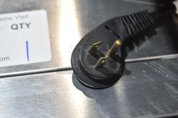 Plug and label on Perlick HC48RS4S-00-SLFLR-SRFLR back bar cooler, 115V, new with minor imperfections.