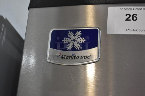 Manitowoc ID0322A-161 commercial ice head on hotel ice dispenser, 115 volts, 1 phase, logo visible on stainless steel.