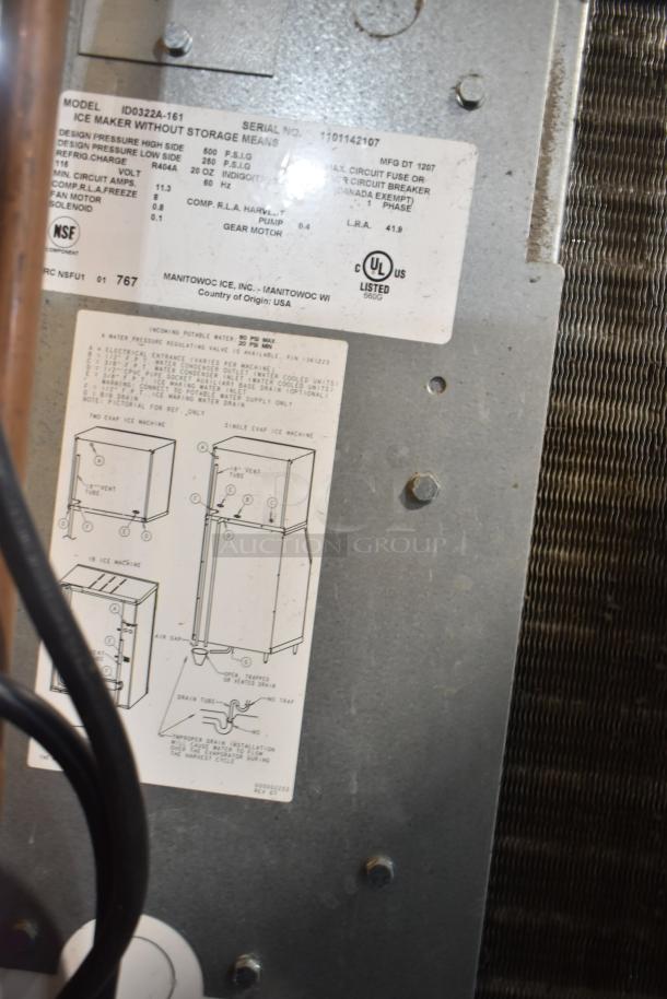 Manitowoc ID0322A-161 commercial ice head on hotel ice dispenser, 115 volts, 1 phase. Label details model and specifications.