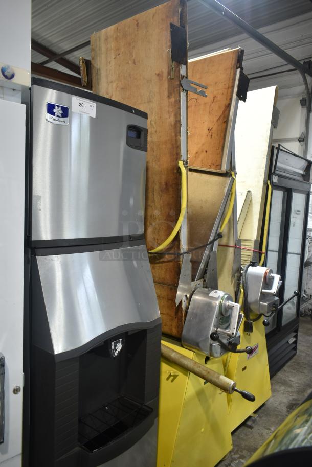 Rondo Seewer commercial reversible dough sheeter, floor style, visible control knobs, yellow base, used condition.