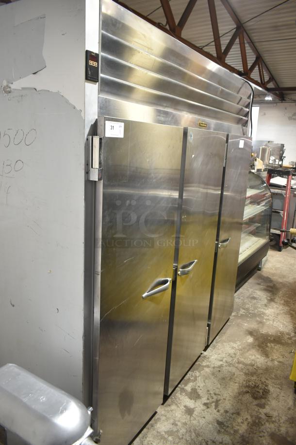Traulsen G31010 Commercial 3 Door Reach-In Freezer, stainless steel, 115 volts, 1 phase, excellent condition.