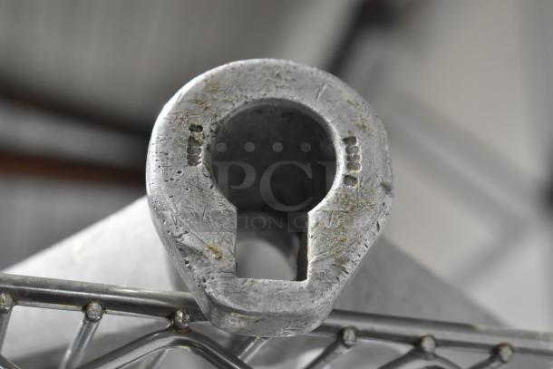 Set of 3 Hobart mixer attachments: whisk, paddle, and dough hook, showing signs of use. Multiply auction potential.