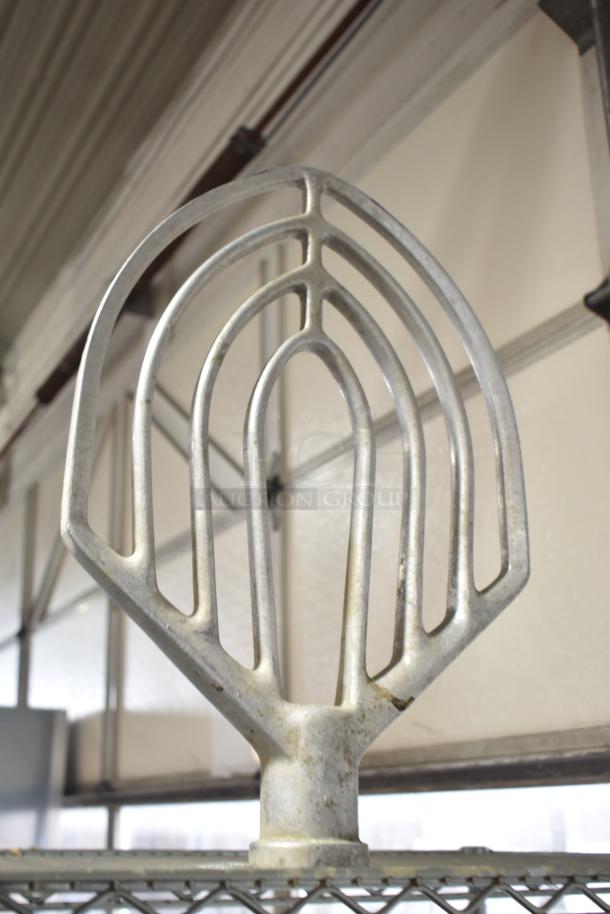 Hobart mixer attachment, 60-quart paddle, metal construction, used condition, ideal for commercial kitchen mixers.