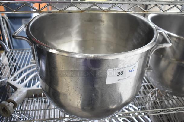 Three Hobart mixer bowls, including D30 30-quart and VMLH-40 40-quart, stainless steel, worn condition, auction label visible.