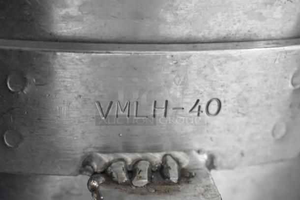 Hobart mixer bowl with "VMLH-40" marking, metal surface detail, part of a 3-piece auction set.