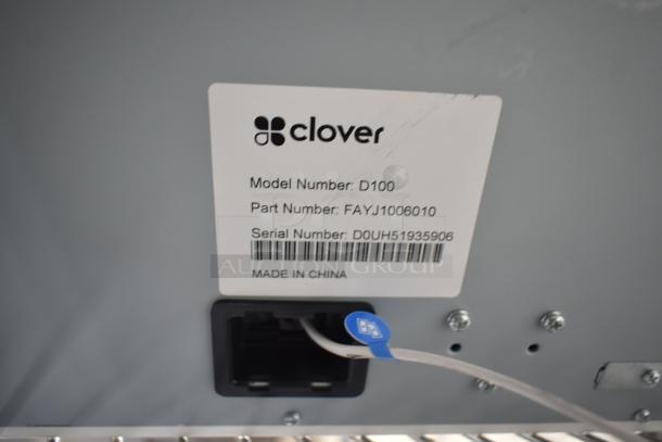 Clover D100 cash drawer with visible model, part, and serial numbers. Made in China label.