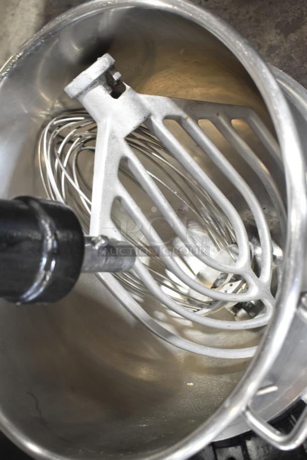 Hobart L800 mixer with bowl, paddle, whisk, dough hook. 80-quart capacity, 220V, 3-phase. Visible attachments inside bowl.